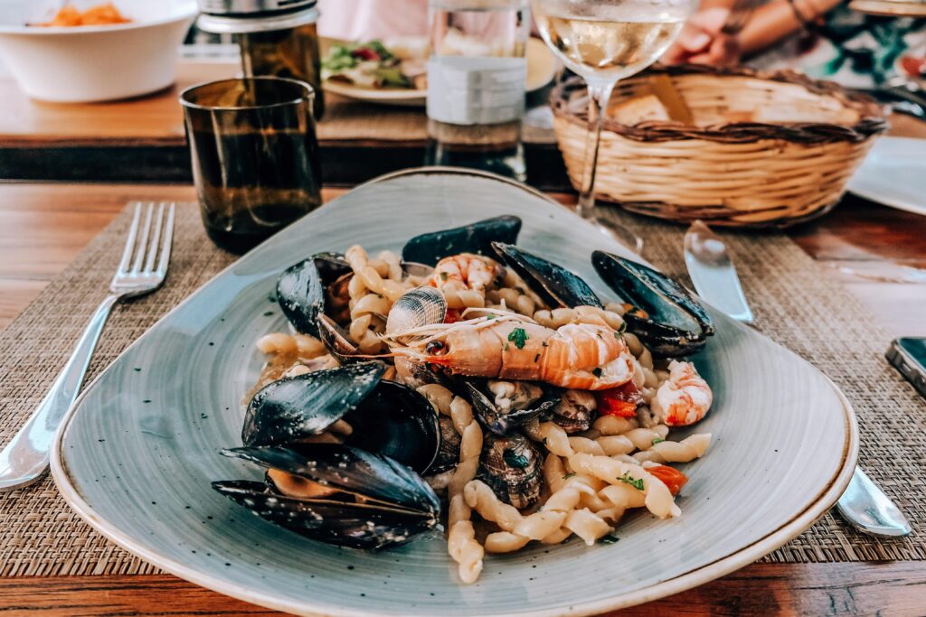 Appetizing seafood pasta with mussels and prawns, perfect for a romantic dinner.